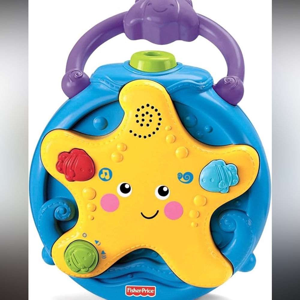 Fisher-Price Ocean Wonders Take-Along
Projector Soother